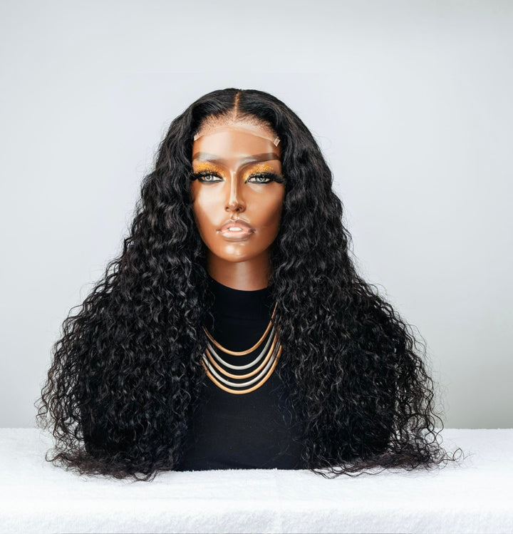 Malaysian loose Wave (4x4 Closure) Wig Long curly water wave wig from The San Hair. It is a glueless human hair weave.